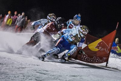 Athletes compete during the first stop of the Riders Cup, the season opener of the Ice Cross Downhill World Championship in Wagrain, Austria on December 10, 2016.