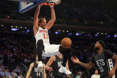 BASKET - NBA - 2016 Nov 9, 2016; New York, NY, USA; New York Knicks center Joakim Noah (13) dunks over Brooklyn Nets center Brook Lopez (11) and Brooklyn Nets power forward Trevor Booker (35) during the third quarter at Madison Square Garden. Mandatory Credit: Brad Penner-USA TODAY Sports *** Local Caption ***