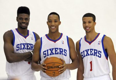 BASKET - NBA - 2013 Sep 27, 2013; Philadelphia, PA, USA; Philadelphia 76ers center Nerlens Noel (4), small forward Evan Turner (12) and point guard Michael Carter-Williams (1) during a media day photo shoot at Philadelphia College of Osteopathic Medicine. Mandatory Credit: Eric Hartline-USA TODAY Sports *** Local Caption ***