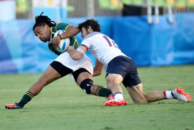 2016 - JO 2016 - RUGBY A 7 Aug 9, 2016; Rio de Janeiro, Brazil; South Africa back Rosko Specman (8) is tackled by France back Vincent Inigo (12) during a rugby sevens match between South Africa and France at Deodoro Stadium in the Rio 2016 Summer Olympic Games. Mandatory Credit: Geoff Burke-USA TODAY Sports