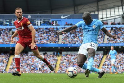 FOOT - PREMIER LEAGUE - 2017 9th September 2017 - Premier League - Manchester City v Liverpool - Benjamin Mendy of Man City cross the ball beyond Jordan Henderson of Liverpool - Photo: Simon Stacpoole / Offside. EDITORIAL USE ONLY - any other use requires an additional license from Football DataCo - www.football-dataco.com